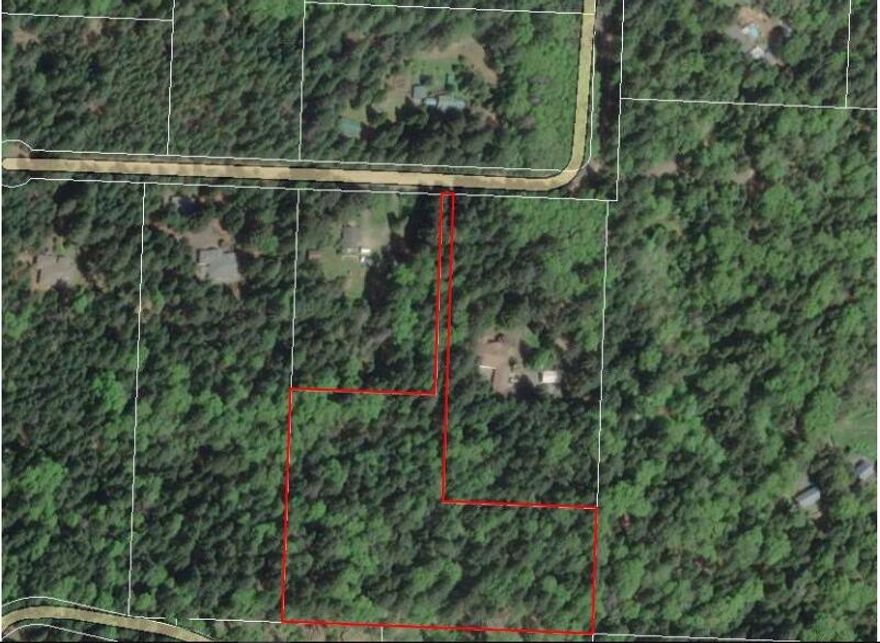 Welcome to 139 Sloan Mountain Lane - a serene and spacious vacant lot nestled in the heart of Grants Pass. This beautiful parcel offers the perfect blend of privacy and natural beauty, providing a rare opportunity to build your dream home in a peaceful, rural setting. Surrounded by mature trees and scenic views, the property offers ample space for custom home construction, gardening, or simply enjoying the quiet lifestyle Southern Oregon is known for. Located just a short drive from downtown Grants Pass, shopping, schools, and the Rogue River, this lot combines convenience with the tranquility of country living. Whether you're looking to build now or invest in land for the future, this is a must-see property with endless potential.