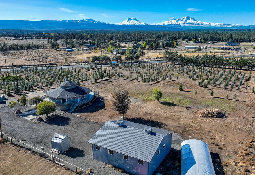 Total house is 2762 sqft: One story w/attic/basement.  Come see the 7 Peaks Tree Farm.  Amazing updated home and property with incredible Cascade Mountain Views.  You'll love this unique style spacious home on 5+ acres w/ 4+ irrigated.  Features & Improvements: 1800 sq ft Shop, RV/Boat Parking/Inside/Outside, 55x30 Greenhouse w/ power/automated irrigation, 700 Blue Spruce Christmas Trees, Auto Irrig. w/ 11 stations 70 sprinkler heads, Woodshed/Well/Cistern Houses, 30 Yr Roof, Energy efficient windows, Flooring- waterproof laminate, Interior paint, Bathrooms-sinks, toilets, bathtubs, showers, vanities, Kitchen Cabinets, Quartz Countertops, Window blinds, 2 New Englander Woodstoves, 2 New Mini-Splits, A/C Heat, Cadet heaters, New Hot Water heater, LED bulbs in every fixture, Finished basement, Wrap-around deck, Upstairs bonus room w/ awesome views,   Freedom of No HOA or CCRS restrictions & low property taxes.  Located in the Popular Sisters School District easy drive to Sisters/Bend.