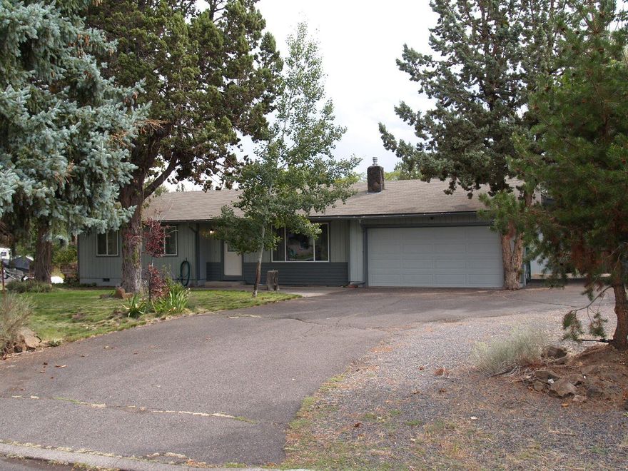 Great location on the north end of Bend for this large near half acre corner lot! Plenty of room for the RV & toys! This single level 3 bed, 2 bath home just received an updated kitchen and both bathrooms. New furnace and AC two years ago. New windows and additional blown in attic insulation three years ago. New exterior paint in 2024. 12 X 8 garden shed, plus additional large storage and shelving on south side of home! It's two minutes to Skyview Middle School and three minutes to COSTCO! A great value to own your home in Bend! Best not to drag your feet on this one!