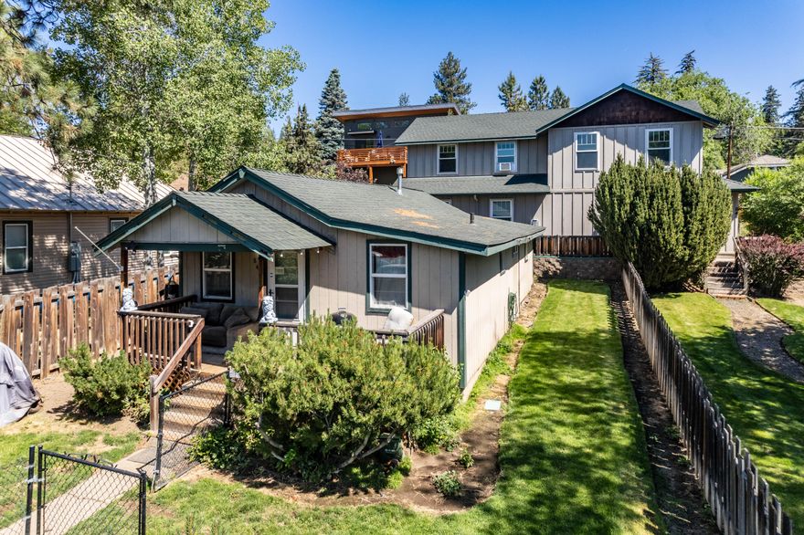 Fantastic investment opportunity in the heart of Bend's most popular neighborhood, one block off Newport and 9th, walkable to the Deschutes River, popular restaurants, coffee and shopping...right in the sweet spot for the area. Essentially a triplex, this property includes a quaint 1932 home on the front and a modern 2003 duplex on the back with solid tenants in all 3 properties, which have been professionally managed and maintained for years. If you want to hold income-generating property in one
of Bend's best neighborhoods, or plan a dream home with an income producing duplex on the back, take a close look at this before the moment passes.
