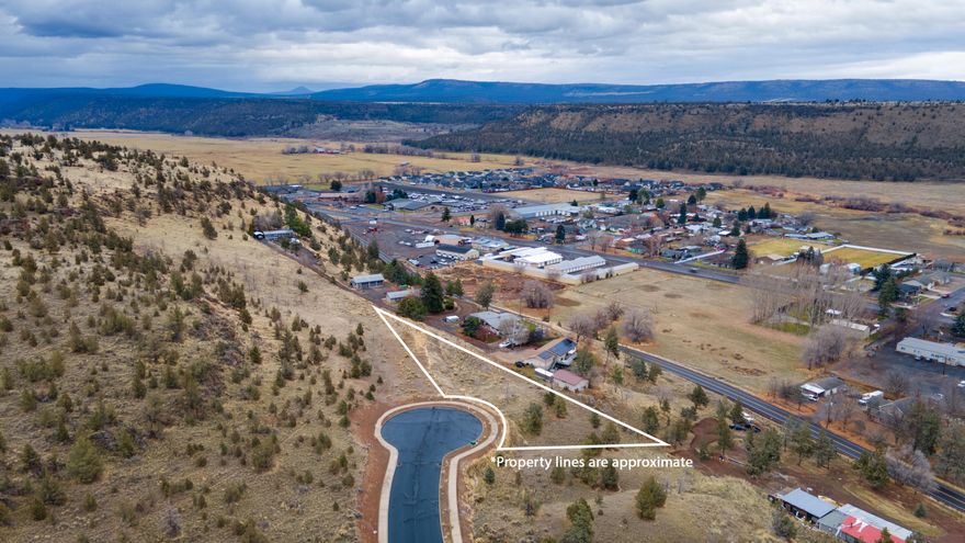 Discover your perfect building opportunity in Prineville! This large, elevated vacant lot offers stunning valley and rimrock views, presenting exceptional potential in the premier IronHorse subdivision. You'll appreciate the easy access to the renowned Barnes Butte Trail System, outdoor enthusiasts will appreciate having hiking adventures right at their doorstep. Families benefit from close proximity to the Barnes Butte Elementary School, making daily routines convenient and stress free. This spacious lot provides ample room for your architectural vision, whether planning a cozy family home or something more expansive. This quiet neighborhood is close to a variety of dining, shopping, and medical facilities.
