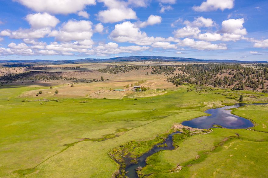 The historic Humphrey Ranch, dating back to 1875, is a 500 head cow/calf operation stretching across 9,430 deeded acres nestled in the foothills of the stunning Ochoco Mountains. Located in the draw-only Ochoco Hunting Unit, the ranch is a hunters oasis with abundant elk & mule deer populations. Turkey, chukar, grouse, duck & geese also call the area home. In addition to the deeded acres, a generous 27,906 acres of grazing allotments (1,783+/- AUMs) supports the cattle operation. The property currently has 707 acres of native grass hay fields & three stacking yards. Featuring magnificent views of lush green meadows, the private homestead includes a recently updated ranch home, a barn constructed from the finest materials, & a bunkhouse which will stand 100 years with minimal maintenance. Humphrey Ranch has impressive water resources with of 993 acres of water rights sourced from four runoff creeks, stock water well with 2 miles of buried water line, natural springs, & ditch system.