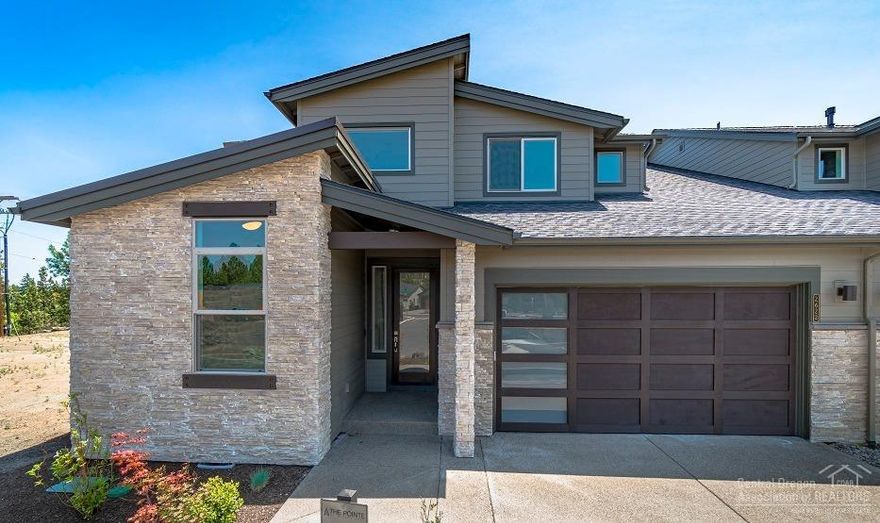 This beautiful home is luxury at it's finest. Walk into this home, listen to the River on the back deck and you won't want to leave. Charmingly placed between the Deschutes River & The River's Edge Golf course, you'll find the distinguished new home community, The Pointe at River's Edge. This beautiful town home sits on the Deschutes River. In this versatile Redford town home you'll experience a 2-story great room w/gas fireplace, main level master suite with soaking tub & w/in closet, upstairs guest suite, additional large bedroom & loft area with wet bar, large mud room/laundry, abundance of built-ins. You'll love the private access to the river that this community affords. Included are numerous Smart home features that complete this beautiful home. Please view attached virtual tour. Photos are of another Redford in this community.