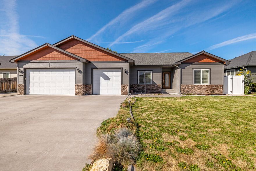 Agent Remarks: Home was built in 2006 by Tom Soyland. Tom Soyland homes offer exceptional value with quality throughout the home. The home is fully landscaped both front and back with inground timed sprinklers. Large deck in back yard and a tuff shed for storage with behind the gate parking. The home has an oversized garage with 3 car capacity. RV allowed with concrete parking space on the side of the garage. Interior flooring has bamboo wood, tile and carpeting. Custom Plantation Wood Shutters will stay with the new owner. This model has been used as a 3 bedroom but has a flex room that could be used as a 4th bedroom, currently configured as an office. Open floorplan with gas fireplace. The quality of this home is obvious, come take a look.