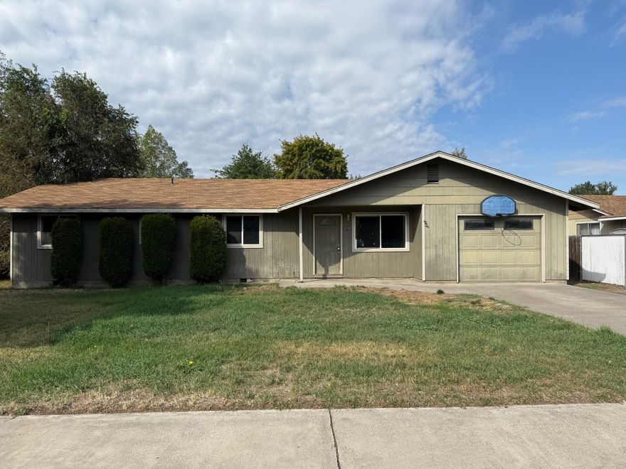 The only SFR house priced under 350,000 in Redmond! Bring your DIY skills and build equity! Huge .23 acre lot with a fenced back yard, small rv/boat parking. R3 zones are for higher-density residential development compared to other residential zones, allowing for more housing units per acre, lots of creative ideas to make this an income producing parcel. This home is in need of TLC due to  deferred maintanance. 4 bedrooms, 2 baths, attached garage, dining area, laundry room.