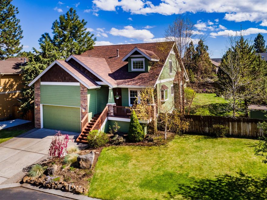 Beautiful, light, bright, spacious and inviting home on the canal in SE Bend. Sitting on a large .19 acre lot , this home offers the best of SE Bend. Master is on the Main level with an inviting back deck, featuring a built in Trager and backing up to the COI canal offering water views and sound. Nice open floor plan invites you in, while the spaces in this home afford a place for everyone. On the main level you have a formal dining room or den with an open kitchen/great room featuring an inviting stone wrapped fireplace and vaulted ceilings. The master suite and a nice mud room/laundry room off the garage. Upstairs features 3 more bedrooms with a ''bonus'' bedroom or storage area. This home will welcome you in and make you want to stay! Nice, quiet neighborhood with miles of trails out your door. You are so close to the new park, high school and all that SE has to offer.