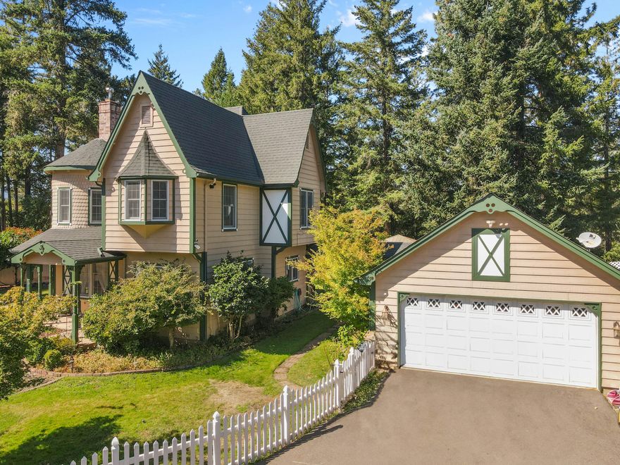 Charming Victorian style home on 2.61 acres in a highly desirable Merlin neighborhood, just 10 minutes to Grants Pass. This 2-story residence offers 3 bedrooms, 2.5 baths, an office, breakfast nook, formal dining room, and spacious living areas. The kitchen features custom granite counters, beautiful white cabinetry, hardwood floors, and tile accents. Renovations include updated bathrooms with custom tile, sinks, and fixtures. Living room remodel completed in 2020 with new carpet and tile. Enjoy outdoor living with a wrap-around porch, LED-lit Trex deck, covered gazebo, raised garden beds with drip system, sprinklers, RV parking, and outbuildings. Recent upgrades include new septic (2019), security lighting (2019), exterior paint, gutters, well pump, and heat pump. Landscaped grounds provide a peaceful setting with excellent curb appeal.