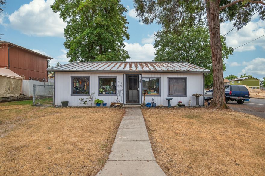Charming 1-bedroom, 1-bathroom home located in Grants Pass on a 0.17-acre lot. This single-level home offers 768 square feet of living space, including a comfortable living room, an eat-in kitchen, and a dedicated laundry room. The bathroom features a shower/tub combo, and the layout provides efficient use of space. The backyard is fully fenced, and the large front yard make for nice open space or potential for gardening. An approximately 120 square foot shed provides additional storage. Currently rented on a month-to-month basis, this property offers flexibility for investors or owner-occupants. Whether you're looking for a primary residence, a rental property, or a project to personalize, this home is a great opportunity to add your finishing touches and build equity. Conveniently located near local amenities, schools, and parks. Buyer to do their own due diligence regarding all aspects of the property.