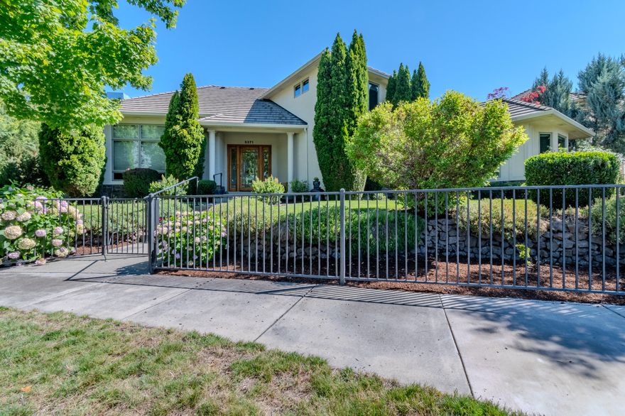 EXPERIENCE LUXURY LIVING ON THE GOLF COURSE in the highly sought-after Island Pointe Community! Perfectly positioned along the 5th and 12th holes of RVCC, this 3,025 sq. ft. Mahar-built home is filled with elegance and timeless design. Enter to beautiful slate floors that open into a breathtaking, light-filled great room featuring soaring ceilings, walls of windows, and a dramatic floor-to-ceiling fireplace framed by custom built-ins. The gourmet kitchen boasts granite slab countertops, stainless steel appliances, hardwood floors, and a sunny breakfast nook, while the formal dining room is enhanced with custom wine storage complete with a cooling system. The main-level primary suite offers a spa-like retreat with double vanity, soaking tub, shower, and walk-in closet. Upstairs includes a spacious loft/office, two bedrooms with stunning views, and a full bath. An oversized 2-car garage with storage connects to a large laundry room for convenience. Don't miss out on your forever home!