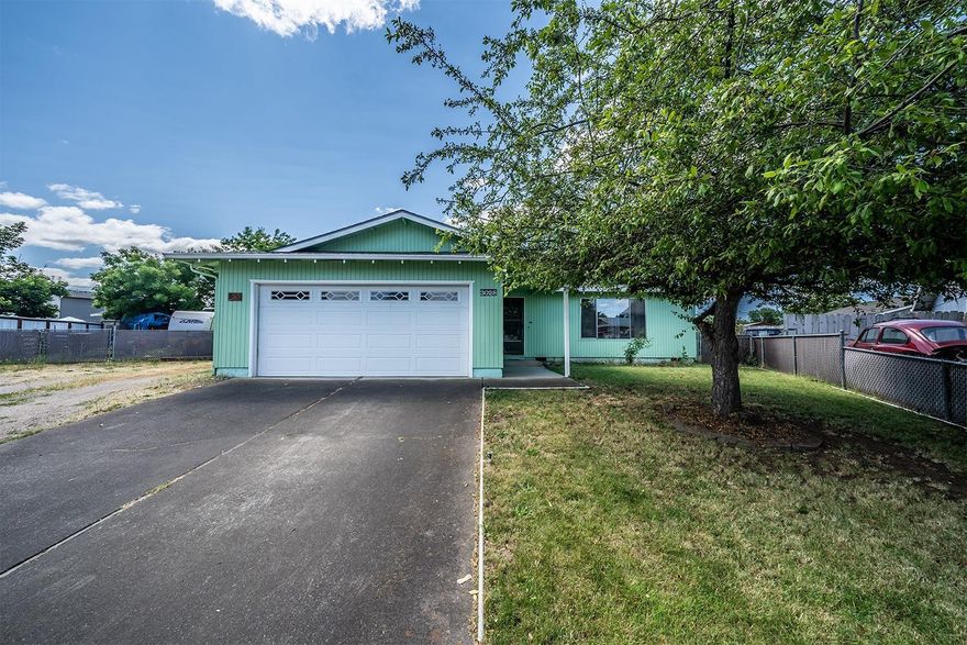 Large .26 acre lot with abundant RV parking!! 3 bed 2 bath home with laminate floors throughout the entry, kitchen and dining. Brick fireplace in the dining room. Newer appliances, new roof in 2013 and new heat pump in 2015. All on a quiet cul-de-sac. Covered back patio and large back yard.