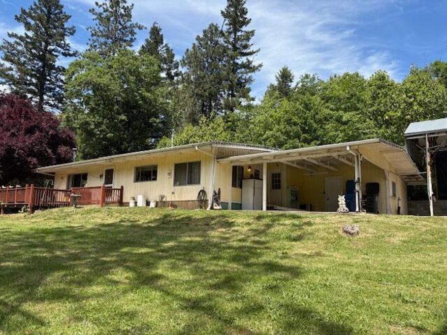 Motivated Seller!!! Excellent opportunity! One level 3/2 on over half an acre that is close to town. One level ranch style home with covered RV parking and detached shop/garage and much more. Priced well.