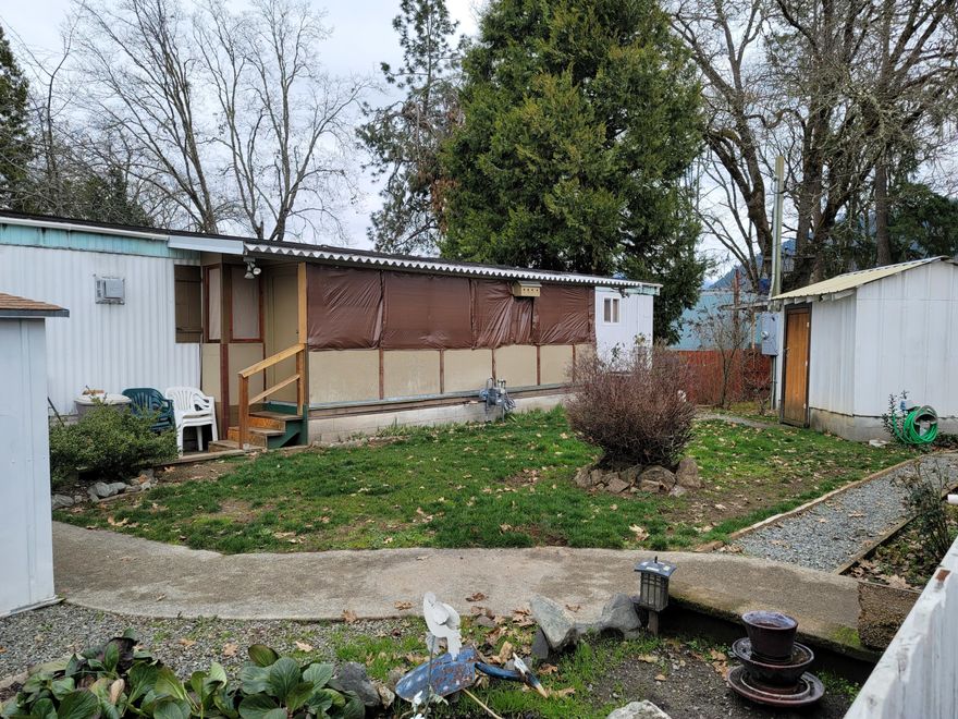 Wonderful starter home or investors delight. 2 bedrooms and 2 baths with add on that could be a 3rd bdrm, study,etc. Great decks in front and back. Roof is metal torch down. Fenced area around the house. 5 sheds all on concrete and in great condition. Close to shopping and hospital.
Natural gas is for gas stove in livingroom only.