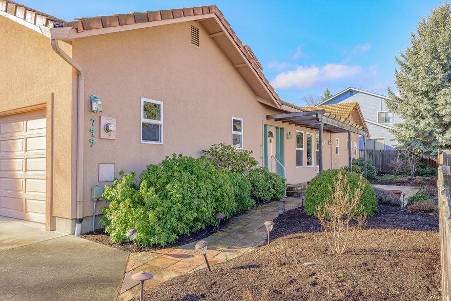 Single Story home on quiet cul de sac. Huge Great room with coffered ceiling and gas fireplace. Large light filled kitchen with quartz counter tops and stainless steel appliances. Relaxing sun porch with plantation shutters and gas stove. Master bedroom has vaulted ceiling, ceiling fan, double vanity and large walk in closet. Tankless water heater. Low maintenance yard. Awning with remote. Bonus room above garage. R.V. parking has electric hookup and dump Tile Roof. A great place to call home!