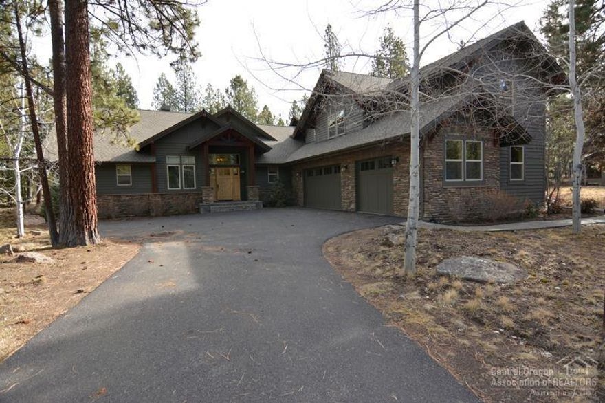 Caldera Springs turnkey rental. This home features 6 bedrooms with 5 masters, 3 on the main level, great room w/vaulted & beamed ceiling, wood floors, floor to ceiling fireplace and slated entry. Kitchen has breakfast bar, slab counters, knotty alder cabinets & stainless appliances. Large family room upstairs to spread out during large family gatherings. Views of Firglass lake, private hot tub and extended living on outdoor decks & patios.