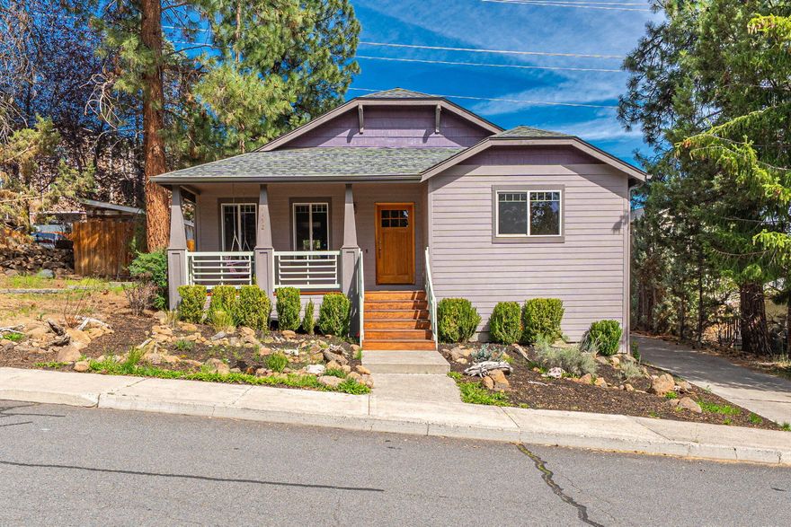 You'll love the location of this single-level home conveniently situated near the base of COCC and minutes from Shevlin Park, NWX, and the restaurants and shops along Newport Ave. The vaulted great room offers a warm and welcoming space with a cozy gas stove and hardwood floors that flow into the dining area and kitchen. The floor plan includes a large primary suite with walk-in closet and dual vanities in the bathroom, plus two additional bedrooms and a full bathroom. Enjoy mornings sipping coffee on the covered front porch or unwind in the backyard with a greenhouse and patio perfect for summer evenings. Got toys? The extra-long driveway has space for your camper or boat, and plenty of guest parking. Enjoy easy access to so much - just a 0.25 mile stroll to a yoga class or beers on the patio at Broken Top Bottle Shop, and less than one mile to Newport Market and the NWX Farmer's Market. Whether you're looking to invest or put down roots, this home should not be missed!