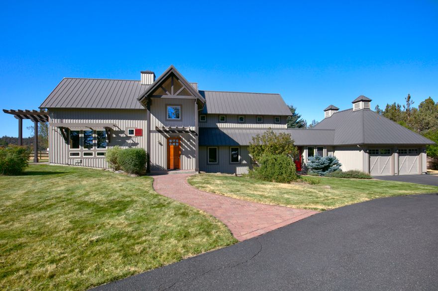 This Tumalo estate is truly one of a kind with custom woodwork and finishes throughout. Cascade mountain views from every window that also overlooks beautiful pastures. Gourmet kitchen with top of the line appliances, pantry, tons of built-ins and access to the paver patio. Beautiful living room with wood beams and large stone wood burning fireplace. Two master suites, one up with a loft office and large on suite.  Bring your horses, llamas, goats and family to this magical property that is set up for a number of different options. The front half of the property is available to grow your own hay.  Multiple fenced turn outs each having it's own shelters and heated auto waters. The original barn provides plenty of storage as well as two additional stalls.  Triple car garage, shop and third bedroom can easily be added onto the home.  Property has a recorded view easement that will protect your view! Please call for your personal tour of this once in a lifetime property.