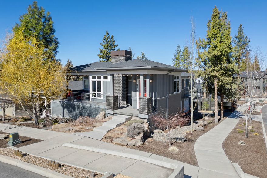 NW Contemporary home with vaulted ceilings and abundant windows to usher in natural light.  SINGLE LEVEL living with all the bedrooms on the main level and a 23 x 18 BONUS ROOM downstairs. Peek-a-boo CASCADE VIEWS from the Westside of home.  Great room with gas fireplace opens to the outdoor living space with built-in heaters and sunshade perfect for enjoying the sunsets. Well-appointed kitchen with island, quartz counters, SS appliances to include a 5-burner range & wall oven, pantry and door to a balcony perfect for BBQ's. Bright office with French doors.  Primary bedroom suite with walk-in closet, walk-in shower, soaking tub and double sinks.  Wood floors throughout the main level. 600 SF garage plus a 364 SF storage room with dual access.  BONUS ROOM  above Storage (23x18). Professional landscaping with a water feature and large fenced backyard. NO HOA. Near Talline subdivision, slated for a park and mixed commercial businesses.  Close to Shevlin Park and trails.