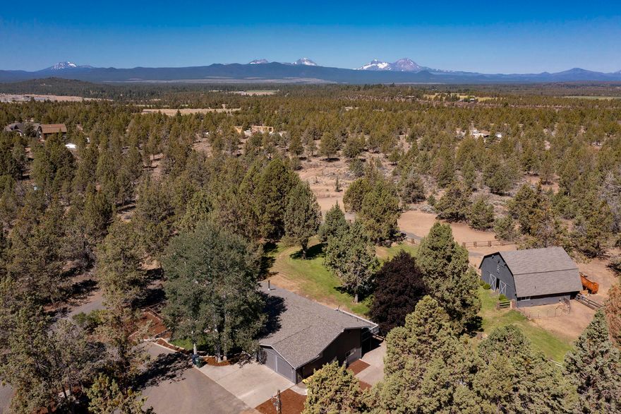 Come enjoy this like-new custom home on 17 acres w/ stunning Western views and the potential to subdivide in the future (Seller has engineers plans upon request). This fully remodeled 5 bed, 3.5 bath is the perfect private retreat yet extremely close to all things Bend, for shopping, schools, and recreation (specifically Deschutes River). Not to mention insulated barn for animals projects below and gym recreation that is insulated & climate - controlled in the 2nd story above.  This home will not disappoint; come view and make this unique home on land offering yours today!