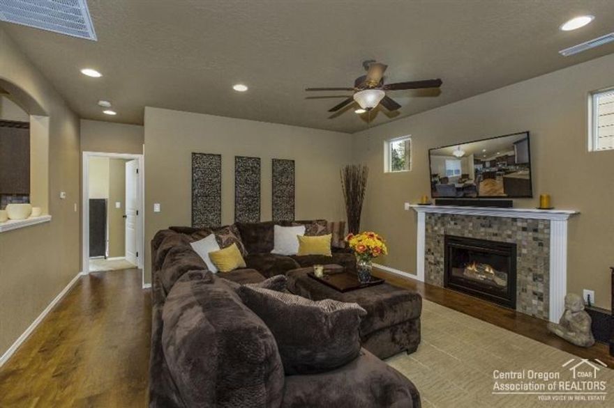 Popular Harrison floor plan by Hayden Homes' community in NE Bend - Monticello Estates. Master on the main, fireplace, open living/great room, plus two sizeable bedrooms and loft upstairs. Home includes: Fireplace, 8' garage door, 4' garage extension, 8' tall garage door, added windows throughout, wood wrapped windows and more. Move in: April/May 2017.