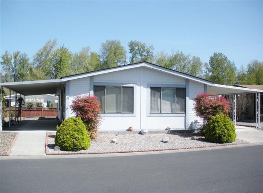 Nice Silver Crest home located in Talent's desirable 55+ Mountain View Estates. Very spacious living room with lots of windows, a built-in china cabinet & dining area. Roomy kitchen has a new dishwasher & refrigerator. Both of the good sized bedrooms have a walk-in closet. The master bath has double sinks, a skylight & a walk-in shower. There is a covered porch to relax on, an attached storage shed, covered carport, new heat pump in Oct. 2013 & an easy care yard. For those of you with a green thumb, there is a sunny spot for a garden. Park rent includes access to the clubhouse, swimming pool, sauna, pool tables, Jacuzzi spa, recreation hall with a full kitchen, library & pays for your sewer, trash & water. Lots of opportunity to meet new friends at all of the numerous social events. Park rent is $440 month