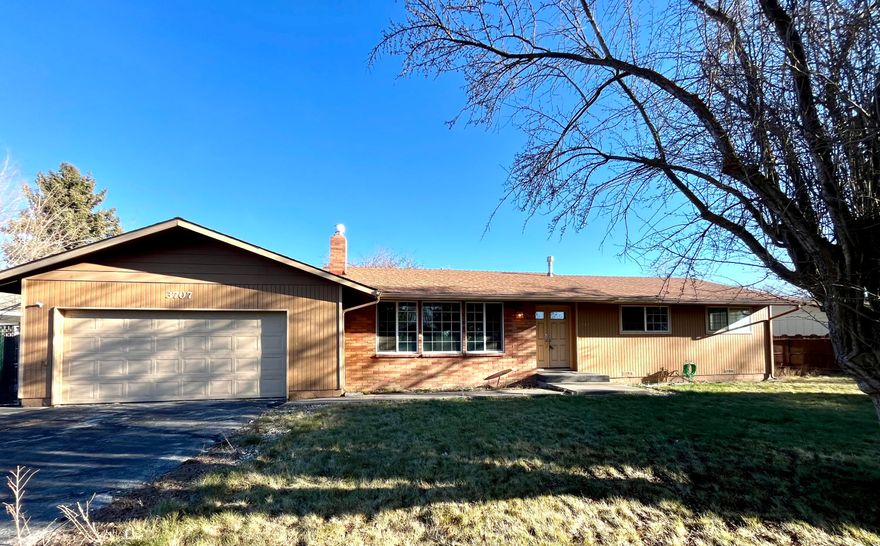 Desirable neighborhood with plenty of space for your RV, this 3 bedroom/ 2 bathroom home in the South Suburban neighborhood of Sunset Village offers an open kitchen with a pantry, gas range, and an attached dining nook. The primary bedroom is on the main floor, with updated bathroom fixtures. 2-car garage, a fully fenced yard, a covered patio in the back yard, and mature landscaping out front. Make your appointment today!