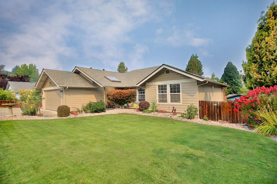 Gorgeous home in a desirable neighborhood - beautiful hardwood floors throughout, vaulted ceilings, tile shower and that's just the beginning. Step out the dining room door onto a stunning deck that spans the entire back of the house, then step down into a back yard that is truly a work of art in itself complete with gazebo to kick back and enjoy some leisure time under. Mature landscaped front yard and raised garden beds complete this breathtaking property. This is what they mean when they say pride of ownership! You really don't want to miss this one! No showings until 9/21.