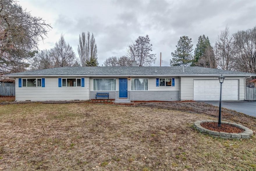 This beautiful 4 bedroom 2 bath home has just been completely remodeled to perfection! New kitchen cabinets, island, granite counter tops and pantry. New Samsung stainless steel kitchen appliances (refrigerator, oven/range, microwave and dishwasher.) New master suite features dual sink vanities, rain head shower with wand, bench seating and a walk-in closet. New dual sink vanities, toilet, tub, tile throughout floors and tub walls in hallway bathroom. New laminate wood flooring in the living room, dining room, kitchen, and hallway. New carpet in the bedrooms. New French Doors in the kitchen and master suite. Dual side fireplace. New ceiling fans in 3 bedrooms. New electric water heater. New finished garage with new garage door opener. New roof and it has fenced-in back yard. Home also has forced air heat and air conditioning. This turnkey home is located in the Suburbs and will not last long, come and take a look today!