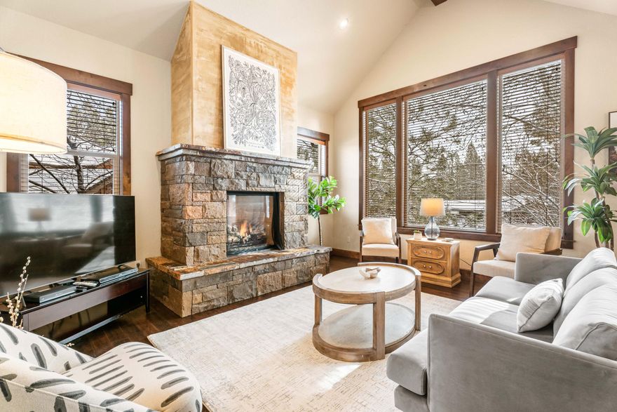 This coveted Short Term rental permitted townhome allows new owner to spend time throughout the year and also receive income for when it is not in use. Located in the westside gated Points West subdivision, this luxurious townhome offers 4 beds, 4.5 baths, with primary suite on main floor. Designer selected finishes, gourmet kitchen w/ leathered granite countertops, hand scraped wood flooring, and tile upgrades throughout the home. Downstairs features a cozy stone fireplace, glass french doors to office, and paver patio overlooking Duck Landing water feature. Upstairs, find 3 oversized bedrooms, all with their own bathrooms. Location is an outdoor enthusiasts paradise with Mt. Bachelor and Cascade lakes only minutes away. Nearby mountain biking trails & paved U-haul bike trail to ride safely to town, and a trail to walk along the Deschutes River is located within the community.