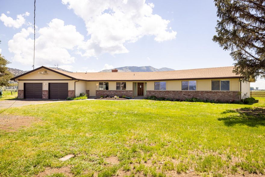 Looking for a slice of heaven? Here it is! 10 acres of pasture ground with A water rights and lost river runs through the back of the property! The home boasts 4 bedrooms 2.5 bathrooms, living room and great room. Enjoy morning coffee sitting on your covered patio that overlooks your pasture and backyard. The property has a Wonderful green house for all your plant's needs! Pasture is fenced and cross fenced, and there is a potato cellar on the back of the property for storage or equipment storage.