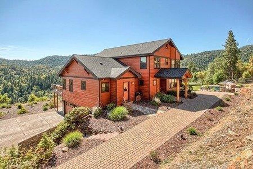 Beautiful luxurious country living on 19+ acres! Gorgeous valley views from quality crafted home boasting attractive & well-planned amenities throughout. Hickory wood floors, Douglas fir trim & solid Alder doors. Main level living; upper level & finished basement are the bonuses! Tiled foyer opens to great room w/floor-to-ceiling windows & rock fireplace w/raised hearth. French doors to deck off formal living rm. Kitchen features granite counters, eating bar, stainless steel appliances, pot-filler faucet over cooktop, built-in refrigerator, dble wall ovens. Main level master suite features gas fireplace, dble French doors to deck, Travertine tile shower, Jacuzzi tub, dble sink vanity w/sit-down station, walk-in closet. Wet bar in lower level rec rm plus office, guest rm, wine cellar & rm for home gym. Upper level offers 2 guest rms & bath. Great storage! In-ground salt water pool + hot tub & gazebo. 3 car attached garage. Home has high capacity solar power & seller receives rebates.