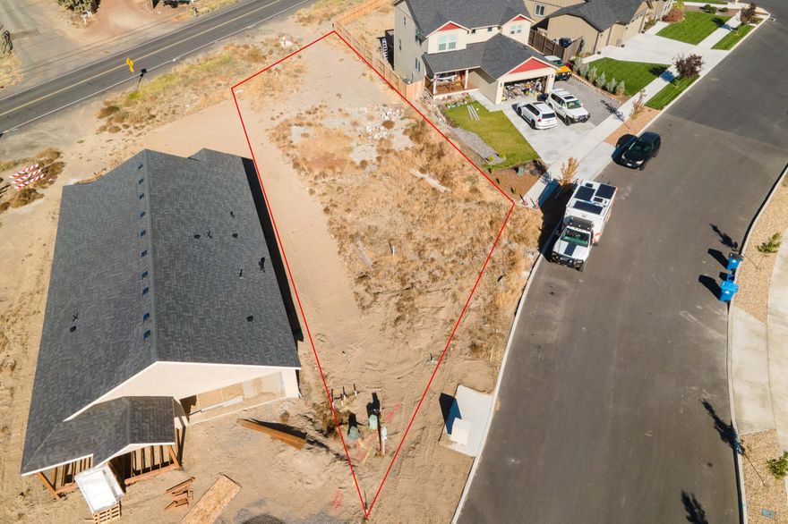 Great opportunity to build on a spacious homesite in the path of progress in Redmond, with views of the Cascade Mountain Range from both the front and backyard. Tucked away on a quiet road with no outlet provides no through traffic. This amazing location allows easy access to Helmholtz and US-126: 20 minutes to both Sisters and Bend. Enjoy the high values in this and the surrounding communities without an HOA. water and sewer are stubbed out to the lot and lot is build ready. Have your favorite realtor reach out to the listing agent for builder recommendations, build to suite, and possible floorplans for this property.