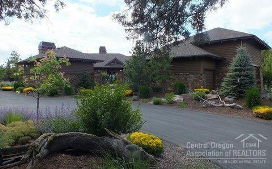 Experience Central Oregon living at its finest in this elegant home with views of eight Cascade Mountains. Vaulted ceilings, walls of windows, travertine floors w/radiant heat, entertainer's kitchen, 1350 bottle wine room and private guest casita are among the many extensive custom features of this remarkable home. The four-car garage with lift for fifth car will not disappoint. This luxury home is warm, welcoming and will impress the most discerning buyer.