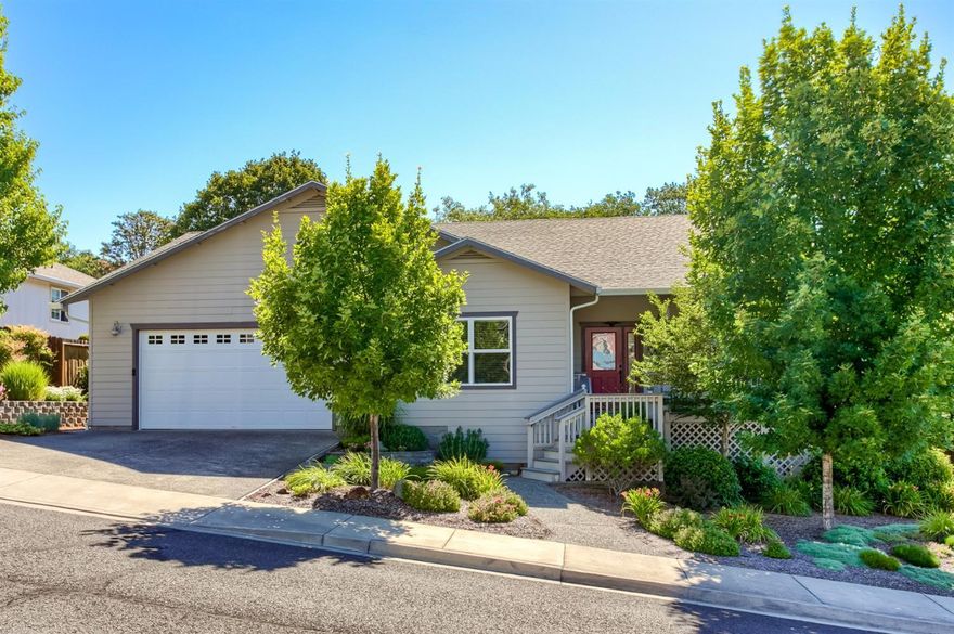 First time on the market for this beautifully designed custom home! Great room plan with soaring ceilings, stunning arches and Italian tile floors. Designer kitchen features Solarium solid surface counters, Cherry wood cabinets with soft close drawers, wall pantry with pull-out shelves, baking center, breakfast bar and sunny breakfast nook. The spacious master suite features a private access and includes a walk-in closet with custom vanity, a soaking tub and dual-headed shower in the bath. Bayed windows, antique style linen closets, custom lighting, ceiling fans, plantation blinds, natural gas HVAC, central vacuum system, hot water circulating pump, indoor laundry, and oversized 2-car garage. Beautifully landscaped with terraced backyard, cobblestone patio, composite decking and covered front porch to take in the wonderful mountain views. You will not be disappointed in this well-maintained, one owner home.