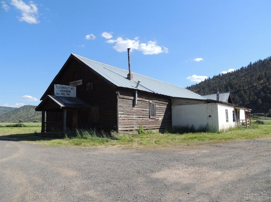 It is time to purchase a piece of Prineville history. Lookout Mountain Grange brings with it many memories for those whom live in Prineville. Approx 4693sf main level with an additional 800sf kitchen area. The driven well has a cold water pump. Unique holding tank toilet system. Propane heater which is plumbed for additional heater to be added. The stage with curtain was used for all types of presentations. Storage area behind stage plus and upstairs that overlooks the main level floor.