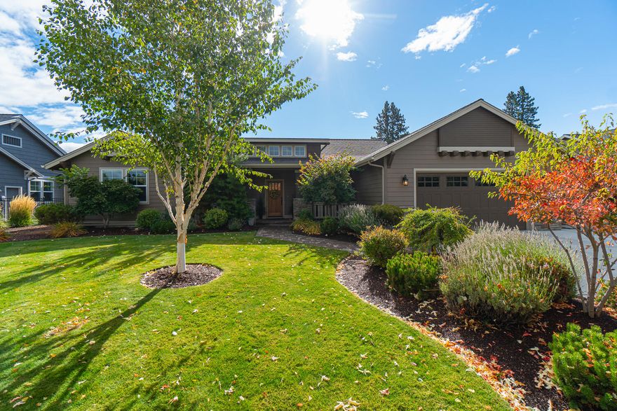 This property is high on the desirability scale. Beautifully and very well built by Rundle Construction. Single level surrounded by a beautifully landscaped .43 acre lot backing to one of the most beautiful canals, with walking trail, in the Bend area . Exceptional parking out front with a three car garage and a drive through 3rd bay. This home is stunning with 
a great room floor plan and copius amounts of windows and natural light. Solid wood floors, tile & quartz tops, recessed lighting, high vaulted ceilings, and a TON of storage options. Wonderful utility room plus pantry, separate office, and 3 full baths (one has a jacuzzi soaker tub). Surround sound. Enjoy a covered front porch and back covered patio with adjacent water feature. 10 X 12 Storage shed included. Central Vac, Xtrordinair gas fireplace, natural gas heat and central a/c of course. Come see this immaculately maintained property.