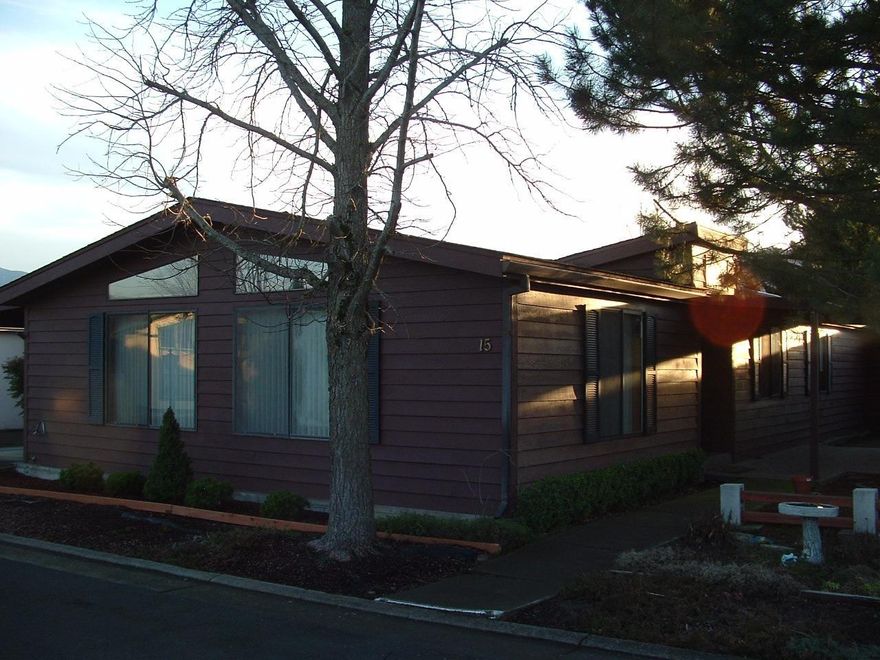 This home is move in ready! Well maintained home, good floor plan, in a great location, on an interior lot in this very desirable 55 and older park; Rogue Valley South. Fresh interior paint, real wood lap siding, large carport and two exterior wood sided utility buildings that match the home. Park amenities include a club house and pool.