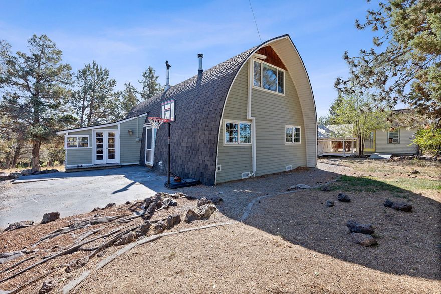 Not the atypical home in a neighborhood, this beautiful A-Frame house on two acres with three bedrooms and two baths is ready to be your new home. The T&G woodwork inside is a must see. Kitchen shines with a white farmhouse sink and white quartz countertops. The cable railing system on the banister adds a sleek contemporary aesthetic. Make the outside your personal oasis with multipurpose outbuildings, large garden space, 0.4 acres water rights and room to customize all. Views of Mt Jefferson can be seen from the outside fire pit. Schedule your showing today.
