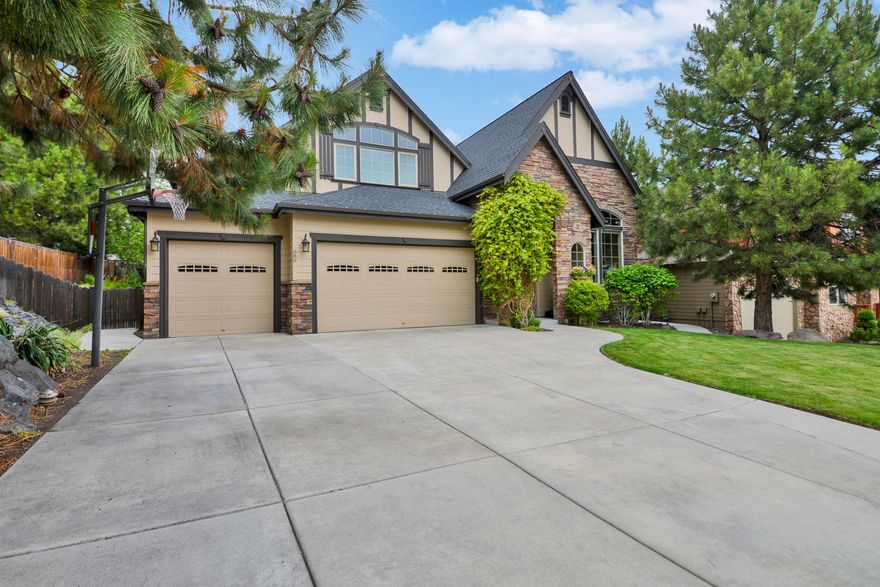 Welcome to 689 NW Powell Butte Loop. Cross the threshold and you are greeted with a wall of windows looking out to the lush backyard & signature Bend blue skies. The downstairs of this home hosts a cozy eat-in dining space in the kitchen, as well as a formal dining room, half bath, laundry room, living room with a built-in entertainment center, family room with a gas fireplace & the master bedroom. While in the kitchen you will quickly appreciate the solid surface counters, solid wood cabinets, convenient pantry, functional layout & easy access to the back patio. The large main level master bedroom has an attached bathroom suite with dual vanities, soaking tub, dual shower stall with bench seating, private toilet suite & walk-in closet. Upstairs you will find a full bath, 3 bedrooms & large bonus room with a gas fireplace. While outside, whether shooting hoops in the front, or gardening in the back, this .22 acre home site is the perfect place to make memories with family & friends.