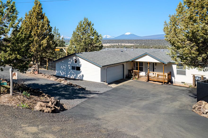 Panoramic views from this immaculately cared for ranchette in the heart of Central Or. Wake up to frosted mountain tops & end your day w/stunning, everchanging sunsets. Come home to an inviting courtyard complete w/cascading stream & bee friendly plantings & a garden bench to enjoy it all. 100% custom prefab home is not one to miss! Full wall of windows in main living space to capture the mtn peaks & allow natural light to filter in. Kitchen ftrs quartz counters, bfast bar, corner pantry, storage, sky light & all appliances. Dining area w/sliding doors to back deck & views! Create your personal sanctuary in the Primary suite with 338sf of open space & a bath w/double vanity, quartz counters & jetted tub. Junior suite ftrs ensuite full bath. Den or 3rd bedroom! Massive deck is perfect for outdoor entertaining w/year round views. Hot tub, manicured lawn, private chip trail around the property for morning strolls, space for pets, toys & RV's. Triple Car garage attached w/shop area.