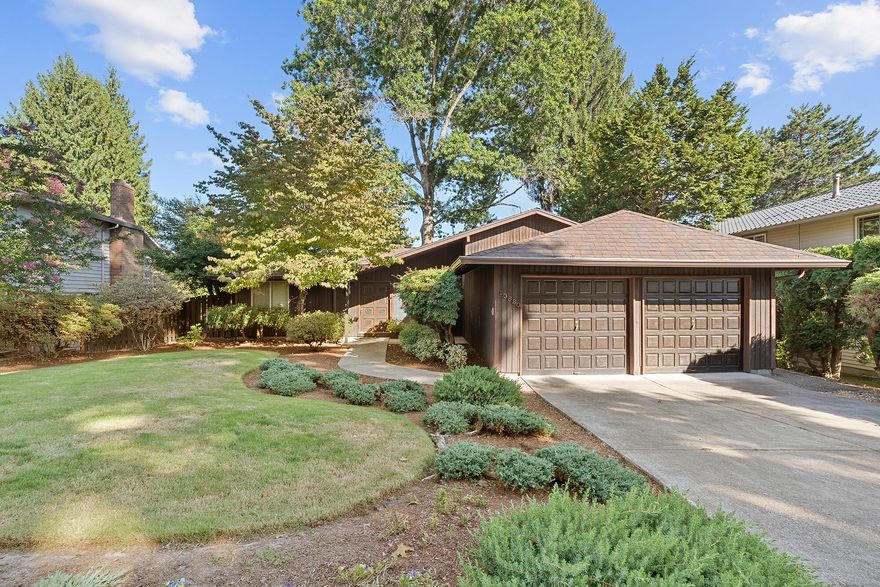 For the first time in 53 years, this cherished Tigard home is ready for its next chapter. Step inside where mid-century modern design meets Northwest contemporary charm in this timeless layout featuring 2,363 square feet of livable space. The vaulted ceilings and exposed beams carry throughout the main level to center around your hybrid fireplace. Spacious kitchen and dedicated dining provide an inviting space for comfort and connection. Designed for life's changing seasons, the upper level included 3 bedrooms and 3 full baths - while the finished lower level holds a bonus room, versatile flex space, and dedicated laundry. Conveniently located just minutes from Pacific Hwy, Progress Ridge, and downtown Tigard. Discover a home that only time can create, and make it your own today!