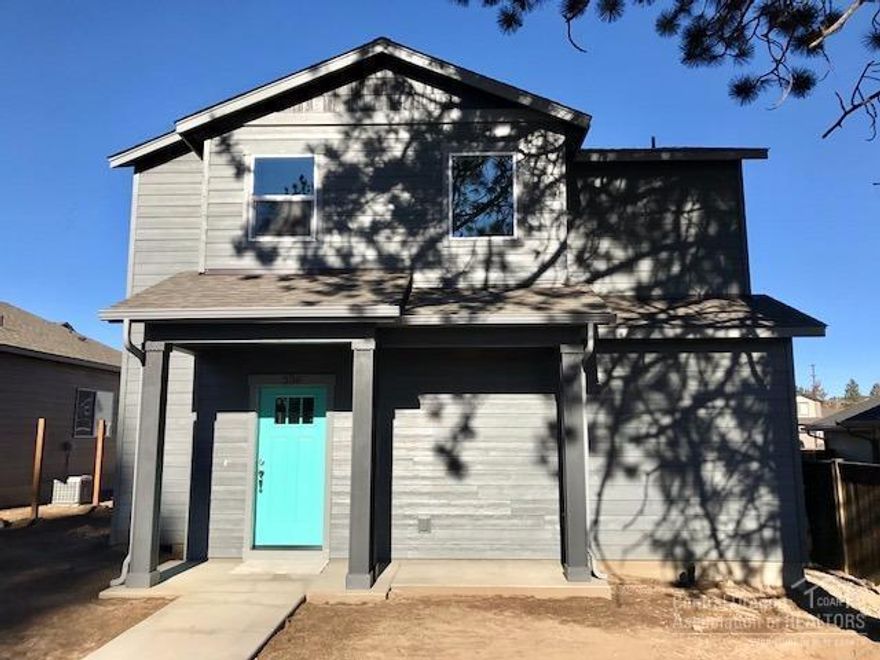 Entered for Comps Only. Efficient open great room plan. Vaulted ceilings, modern white kitchen w/ full height subway tile backsplash, stainless appliances, solid surface counters in kitchen & baths, under mount sinks & custom cabinets. Includes hardy siding, 30-year roof, lifetime windows, high efficiency gas furnace & Central AC. Located just over 1mi from Deschutes River to launch your outdoor adventures, minutes to Old Mill District for shopping/dining, & steps from canal trail.