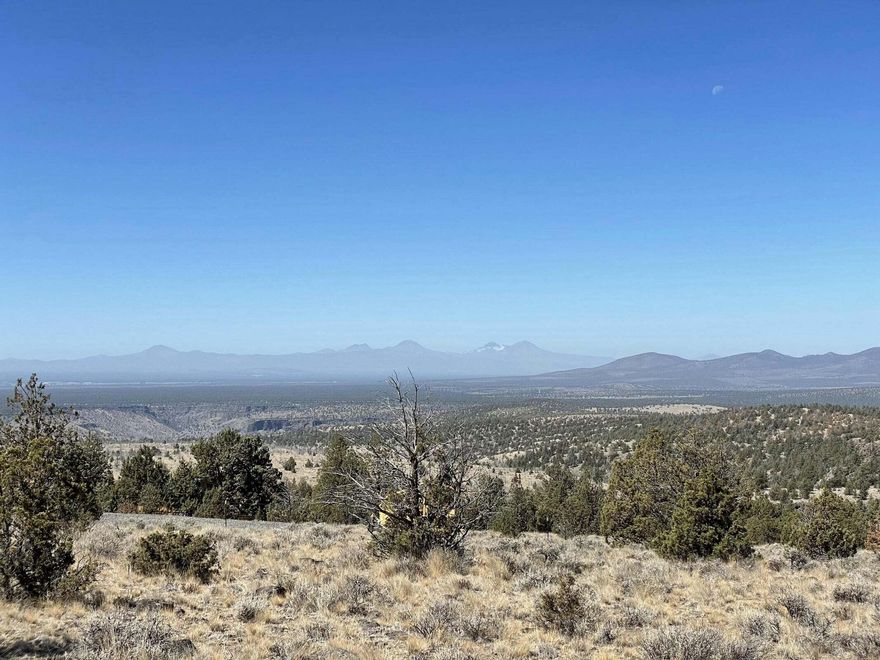 Amazing views on this 1.65 acre parcel. Property is buildable and is located approx 25 minutes south of downtown Prineville towards Prineville Reservoir. Located close to BLM, for a variety of recreational activities. A must-see property as the pictures do not capture the intensity of the views including the Cascades, Smith Rock and some of the Crooked River Canyon. The property is within the Prineville Lake Acres II subdivision and although the CC&R's apply, there are not HOA/road association fees or the SDC at closing. This area is all off-grid. Possible owner terms with 50% down.  Additional maps and information on the area are available upon request.