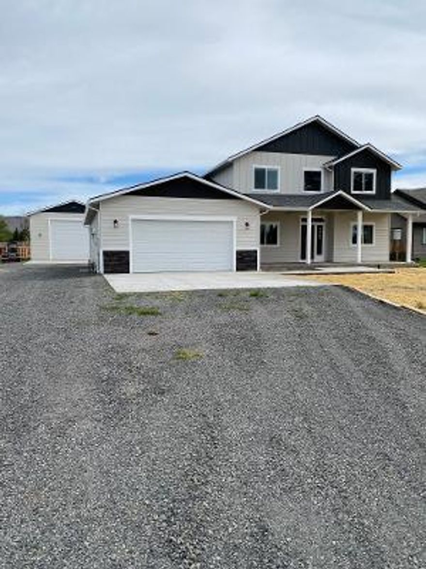 New Construction 4 bedrooms, 2 1/2 baths. Granite counter tops throughout the entire house.  Large open kitchen with all new appliances. Large butlers pantry, Primary bedroom downstairs with beautiful claw foot tub, w/spacious separate shower, large closet.  Open floor living  room with gas insert. Office on main level and dining room.  Upstairs another large living area and 3 bedrooms with full bathroom upstairs.  Two car attached garage and a large heated shop/RV/garage 1792 sq feet. Large yard and plenty of parking. Sprinkler system installed.   This property is absolutely stunning.