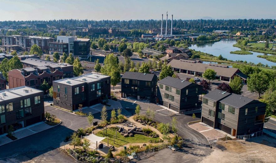 Basecamp, 25 graciously conceived luxury townhomes, was designed for the discerning Bendite who wants the best of all worlds: thoughtful architecture & the best location in town - within walking distance of downtown & w/ easy access to the outdoors. The stylish homes feature open floor plans, floor-to-ceiling windows, luxurious kitchens, premium finishes & 2-car garages. All units have separate studios on the ground floor. This 3 BD, 2.5 BA unit is 2226 SF (incl 300 SF studio) w/ a covered deck & Mtn views.