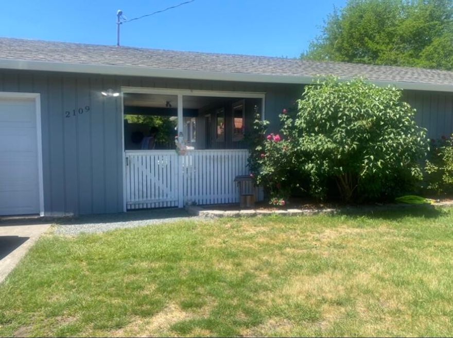 With quadruple paned casement windows, gated breezeway, privacy hedge, and living area in the back of the house, you will find extreme quiet inside this 1053 sq ft home in North East Medford. Close to shopping, Providence Medical Center, and elementary school/park, with a large fenced in back yard and oversized 375 sq ft 1 car garage and covered carport. Over the past 18 months owners have replaced HVAC system, water heater, garage door, gutters, stove, and interior and exterior paint. Hardwood floors were refinished in June 2021, and original hardwood remains under livingroom carpet. Hurry, this one won't last long!