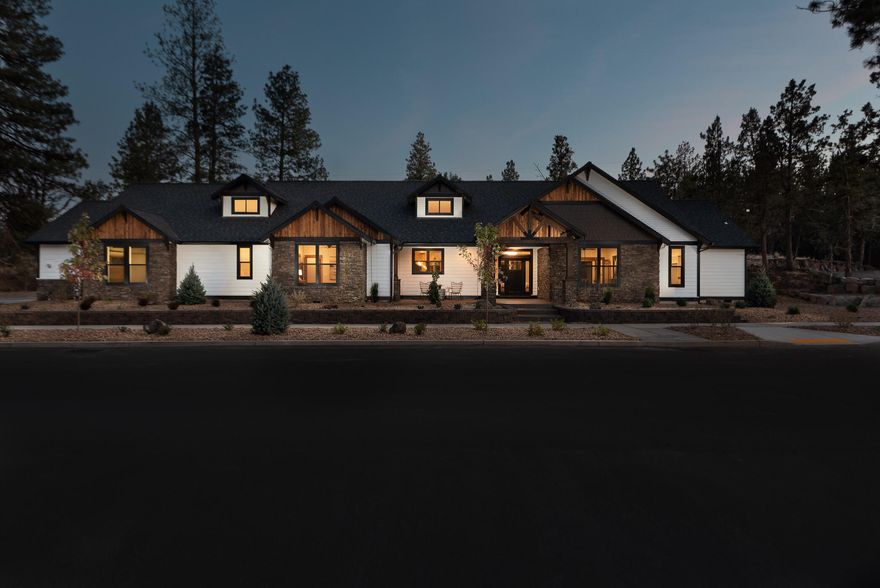 CUSTOM BUILT BRAND NEW, 3004sf one-level on .36 acre within moments to all the Central Oregon fun.
This Great Room plan has a primary wing (featuring master suite, sitting room and adjoining BR4/office/workout room) on one end, dreamy laundry room and two guest suites on the other. Clean lines, bright, vaulted great room area w/stunning stone fireplace running floor to ceiling. Kitchen offers an entertainer's dream island, all black-stainless Bosch appliances, separate work stations, two sinks, two ovens, 2dishwashers, 6-burner gas range. From the kitchen, flow seamlessly to large dining & living areas, then the covered outdoor patios through oversized sliding glass doors. Custom features & finishes include solid surface countertops and black-stainless sinks &appliances, knotty alder finishes, hand-troweled wall texture. Oversized fully finished garage w/shop space & wired for electric car charger. Room left on this lot to build a shop or ADU.