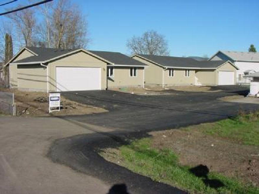 2 brand new homes on a single tax lot. Duplex by zoning. Blinds and air to be installed. Dead end street close to shopping & schools. Hurry, won't last. 2 family setup.