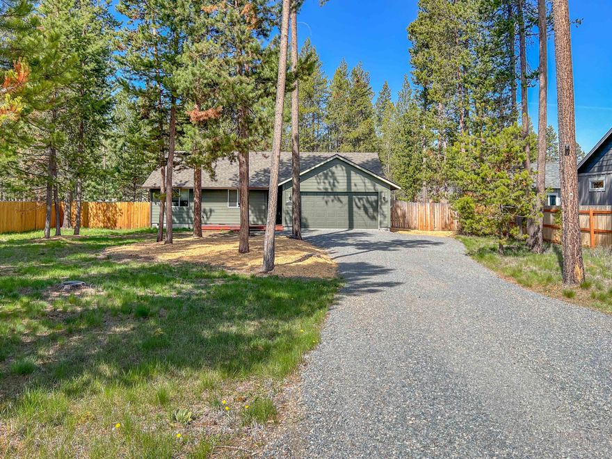 Listen to the whispering pine trees on this nearly 1/2 AC lot near the Deschutes River in Oregon Water Wonderland! Move-in ready, well maintained, Single-level home in a quiet neighborhood awaits you. Home owners have been busy with upgrades such as: new carpet throughout, new SS appliances, interior paint, 12'x16' shed painted to match house, refreshed landscaping, new gutters, new house numbers and refinished decking. Open Living-Dining with vaulted ceiling and lots of natural light. Kitchen island makes meal prep a breeze. Backyard is fully fenced with double wide gate on one side and single gate on the other side. Access the Deschutes River trail is just a few blocks away. Community boat launch is nearby. It's an easy drive to Bend and less than 6 miles from Sunriver. All appliances, including W/D, stay with the home. The OWW community has access to a PRIVATE Marina, and the Association maintains the roads, plows snow, maintains the private boat dock and mailboxes.