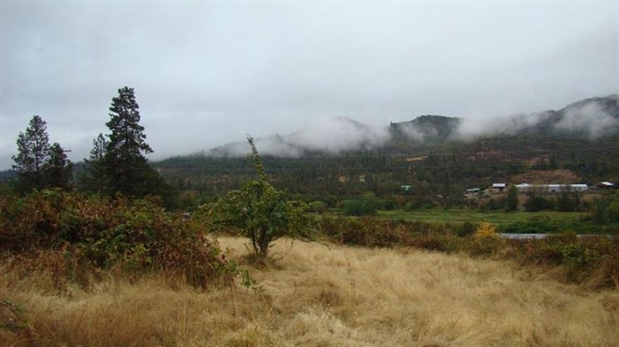 Stunning home site with views and nice scattered trees on this 15.89 acre parcel with 14.2 acres of Eagle Point irrigation rights. Access is from a very well maintained private road right before the property, or there is a pull off directly off Butte Falls Highway. New home site approval, sand filter w/capping fill septic approval. Underground power is on the private road serving other parcels. Land slope at back of property is steeper than the rest of the land but very usable and that is where the irrigation ditch is. The home site approval is almost level on a nice bench. SHOW AND SELL!