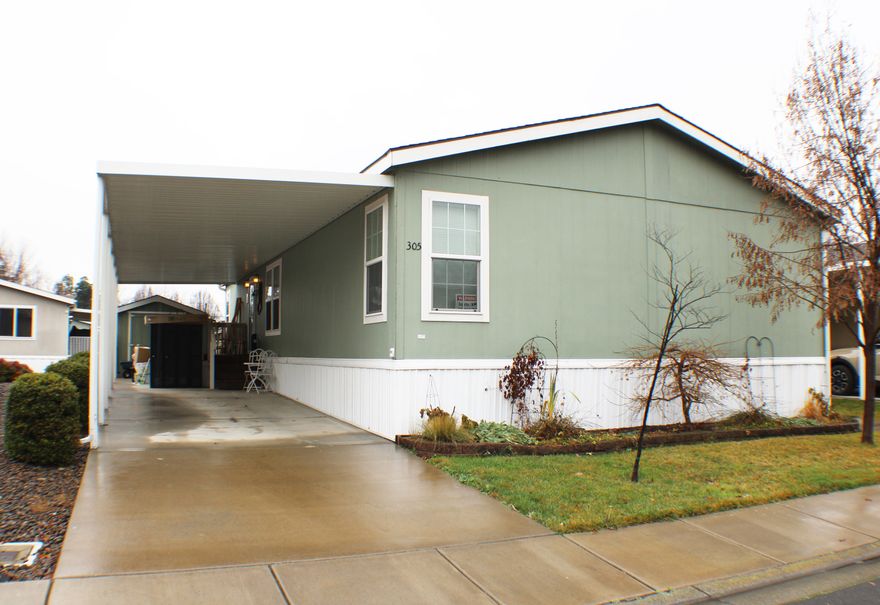 Look no further!!

This Light and bright Champion-built home in desirable Santa George Estates, an all-age community with mountain views. This inviting home features gorgeous custom leathered granite countertops, new flooring, a dedicated laundry room, pantry, and a well-designed kitchen with a breakfast bar and comfortable eating area. Additional highlights include a large shed, carport, low-maintenance yard, and sprinkler system. Community amenities offer resort-style living with an on-site pool, workout room, and a spacious community room available for private events. Up to two pets allowed. Conveniently located near parks, golf courses, and everyday amenities this home offers easy, low-maintenance living in a welcoming community.